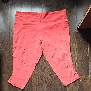 Athleta Vibrant Coral Salutation Stash Capri Leggings
